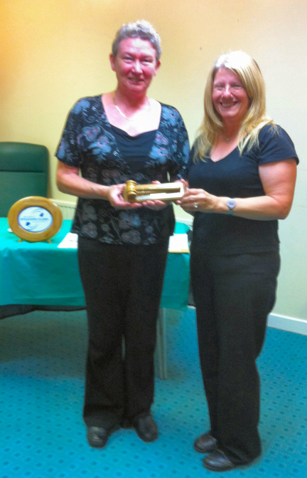 Carol Abbott presents trophy to Sheila Lewis