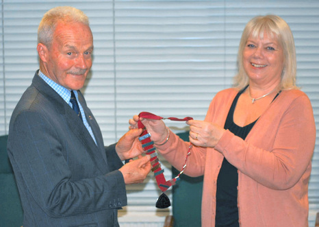 Arthur Murray receives President's chain of office from Sandy Leong